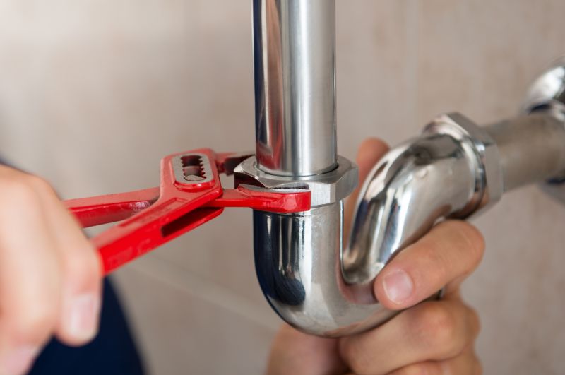 Plumber Using Wrench